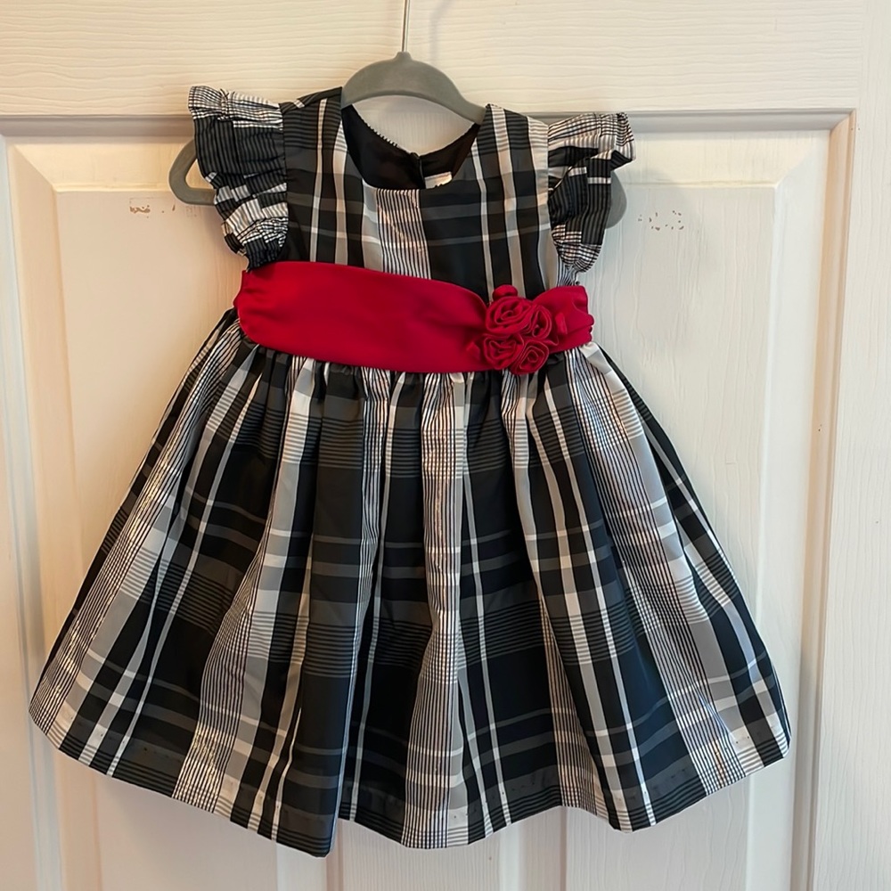Beautiful black and white with a red sash dress